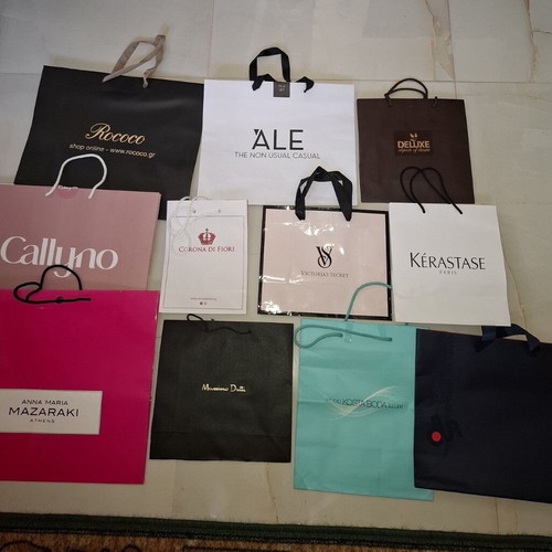 Paper branded bags used, pack of 11 pieces