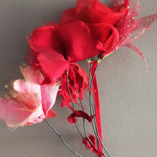 Handmade hanging decorative figure with fabric flowers like new