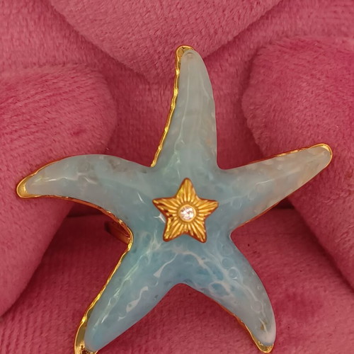 Starfish ring like new with blue marble effect and gold details