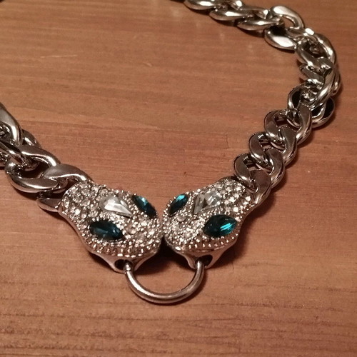 Choker necklace solid with snakes in like new condition