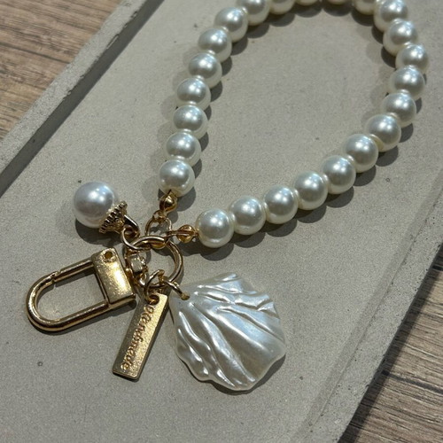 Handmade keychain with white pearls new