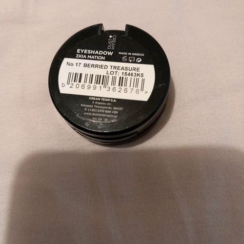 Dust and cream purple eyeshadow, used once