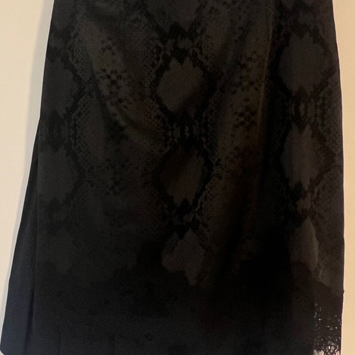 Lauren Vidal short skirt with snake skin pattern and lace trim