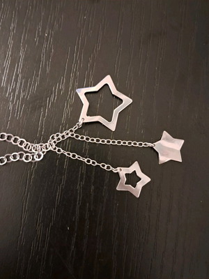 Necklace medium length like new with 3 silver stars