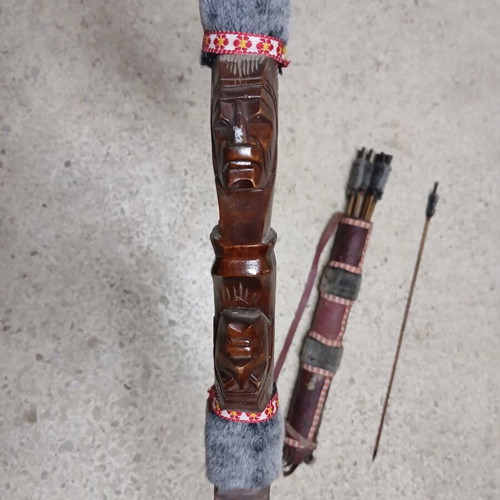 Decorative wooden carved bow with arrows like new