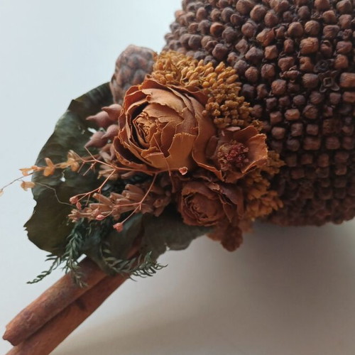 Decorative cinnamon wood and cloves ornament used