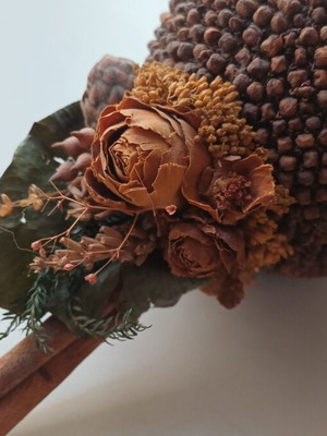 Decorative cinnamon wood and cloves ornament used
