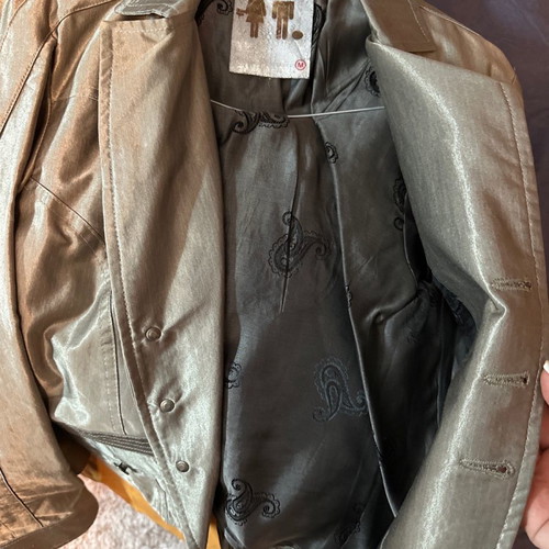 Jacket used in silver gray color size M