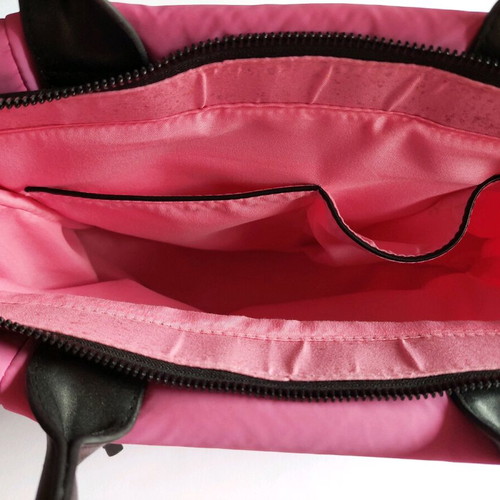 Fuchsia Binnari bag with black details