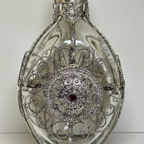 Vintage ornate handmade filigree glass bottle with red stones