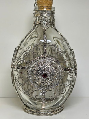 Vintage ornate handmade filigree glass bottle with red stones