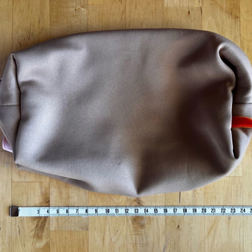 Burgundy soft toiletry bag with zip used