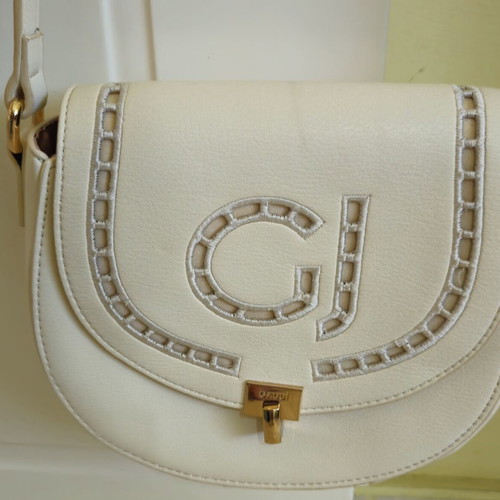 Gaudi white crossbody bag like new with gold hardware
