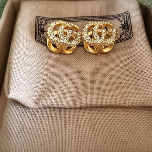 Gucci Double G gold tone earrings 2 in 1