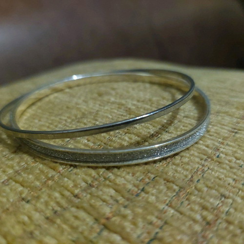 Silver bracelets set of 3 like new with stones and glitter