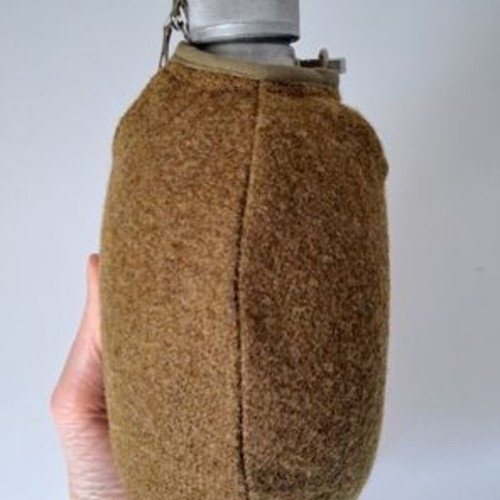 B-N aluminum canteen with khaki wool cover, collectible
