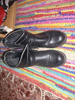 Black leather ankle boots used with double strap and zipper size 36