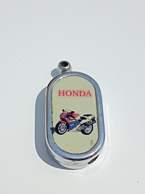 Vintage Honda keychain lighter used, decorative