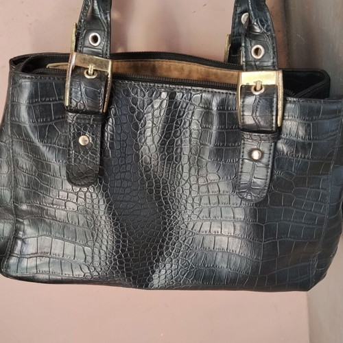 Vintage black women's shoulder bag with crocodile and snake texture, used