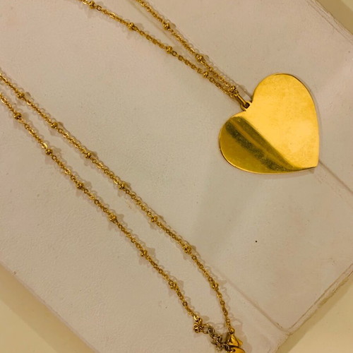 Steel necklace new with long chain and heart pendant