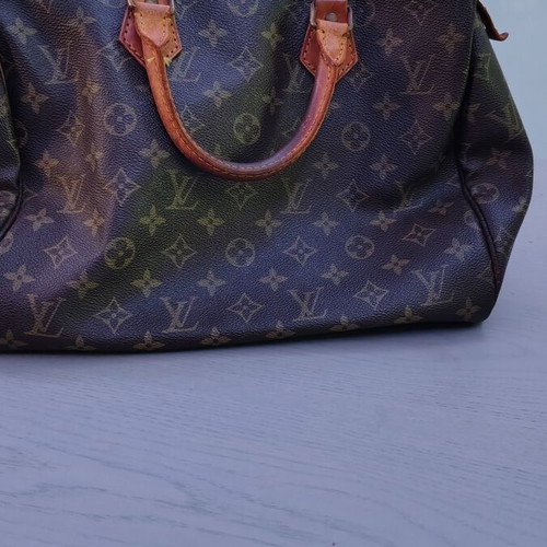 Louis Vuitton Speedy 30 handbag used, brown, zipper replaced, slight discoloration