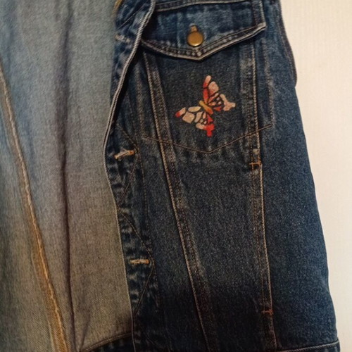 Women's denim vest with butterfly print, size M, like new