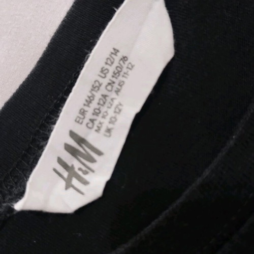 T shirt "ποδόσφαιρο" H&M 10 years black like new
