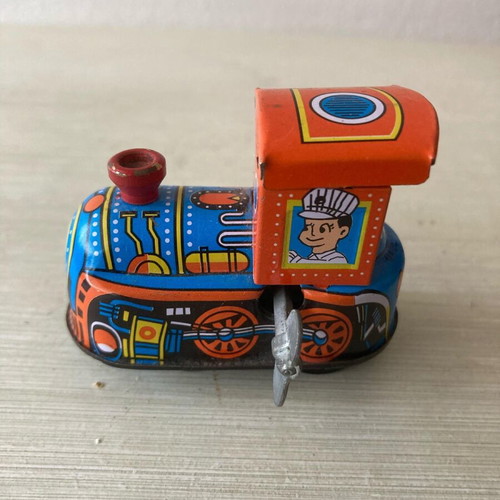 Small metal toy train made in China not working like new
