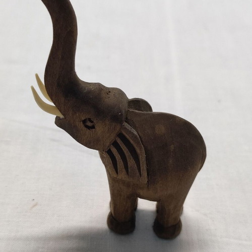 Vintage wooden elephant used with ivory tusks