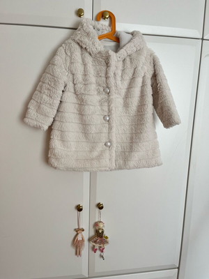 Εβίτα κρέμ γούνα σαν καινούργια για 2-3 ετών