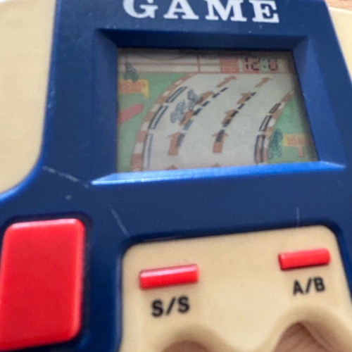Moto racing handheld game used, vintage 80s collectible