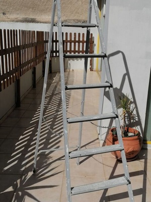 Ladders used, one metal 6-step and one aluminum 4-step