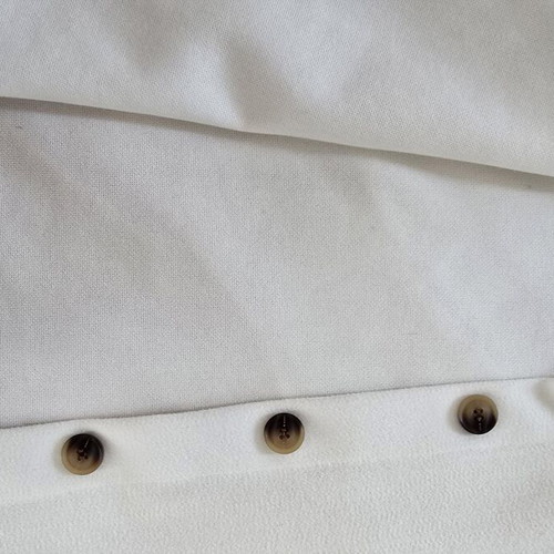 White short jacket with stand-up collar and buttons, minimal style