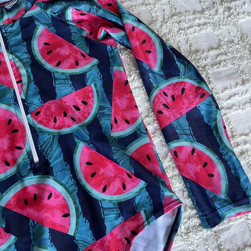 Girls' swimsuit with long sleeves like new, sun protection, size 7-8 years