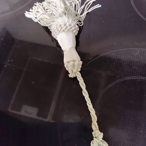 Tassel used, veraman color, length 16 cm