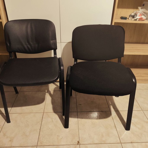 Set of 2 visitor chairs, one leather and one fabric