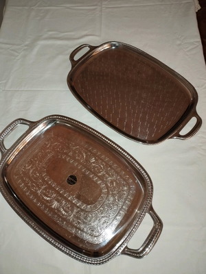 Serving trays set of 2, one used silver-plated and one new inox