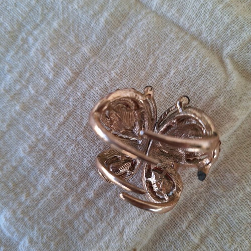 Small butterfly hair clip used with red rhinestones
