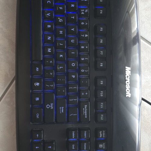 Microsoft Reclusa USB gaming keyboard used with backlight and 2 control knobs