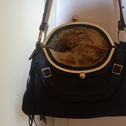 Bulgari women's shoulder bag like new, black leather with gold details