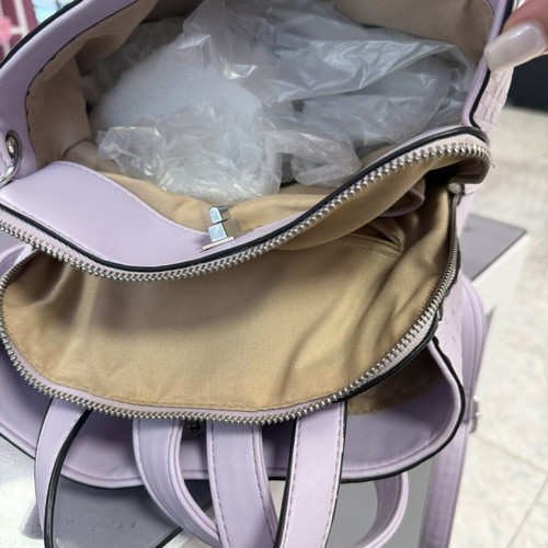 Backpack lilac color like new with 3 large compartments