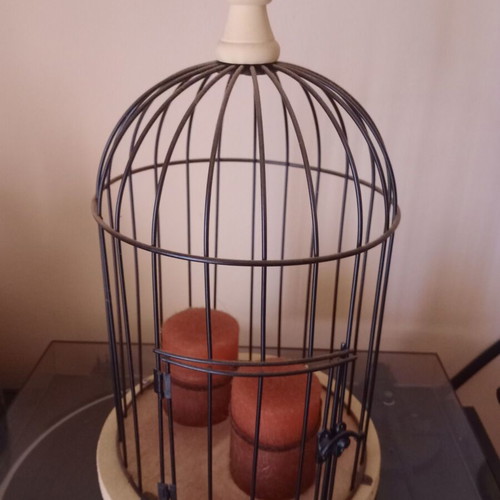 Decorative metal birdcage like new with wooden base and candles