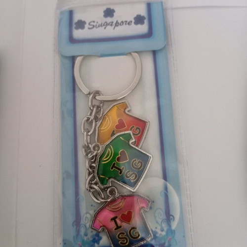Keychain souvenir new from Singapore with three shirt-shaped charms