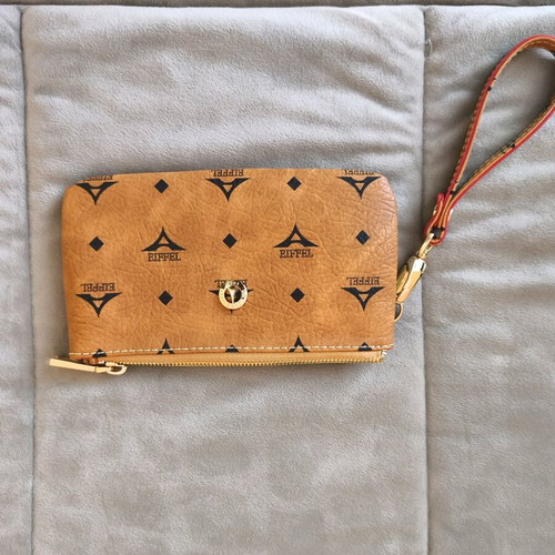 La tour Eiffel Desigual wristlet bag brown like new