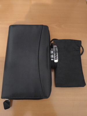 Men's organizer wallet with zipper and bracelet gift like new, black