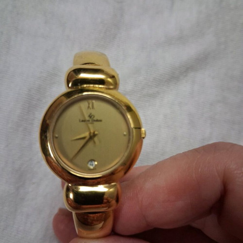 Laurent Dodane women's watch like new, gold color