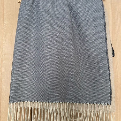 Scarf like new with gray and beige color combination and fringes