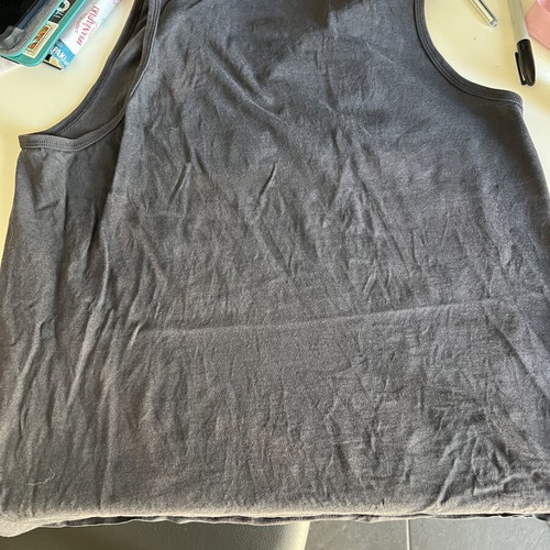 Nike sleeveless shirt used with slight sun discoloration, size M, black and blue