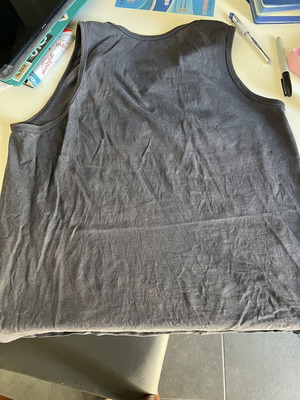 Nike sleeveless shirt used with slight sun discoloration, size M, black and blue