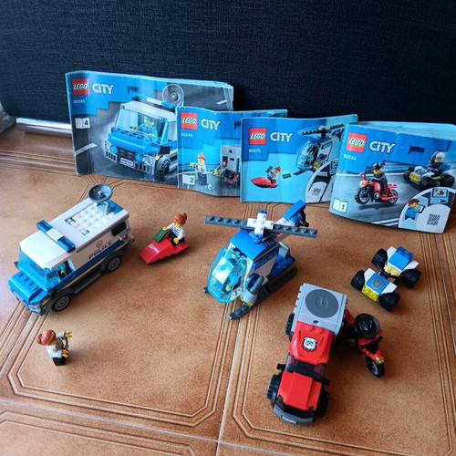 Lego set used with truck, helicopter, and motorcycle